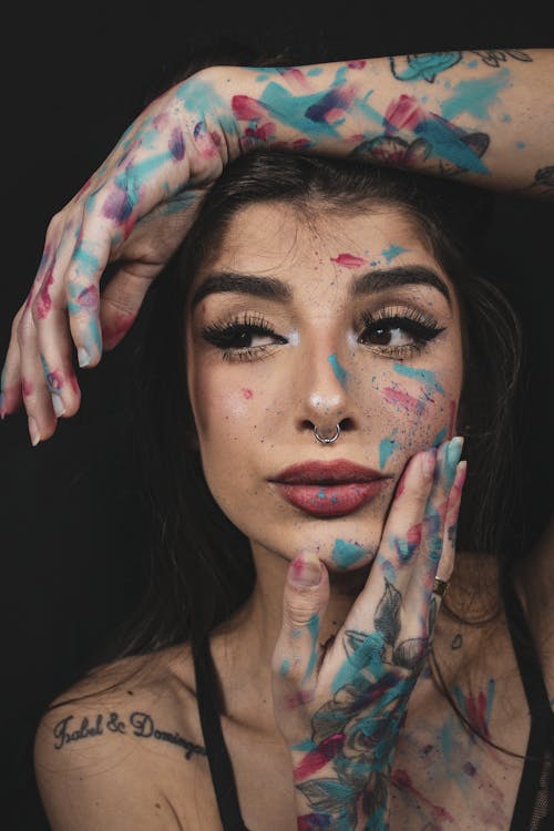 Sensual woman with painted face