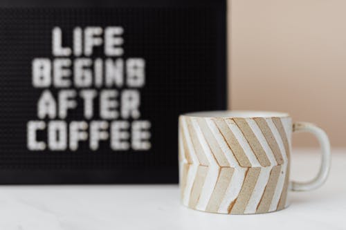 Free Cup of coffee and peg message board with funny title Stock Photo
