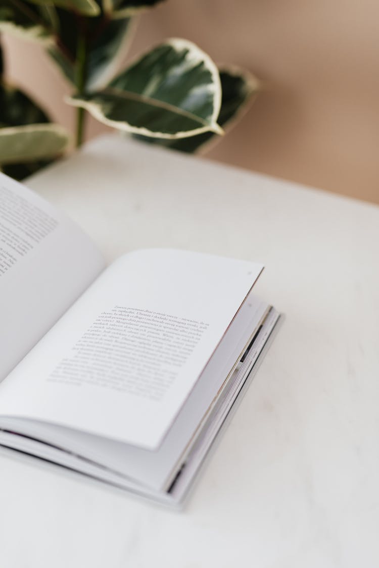 Open Book On Marble Table