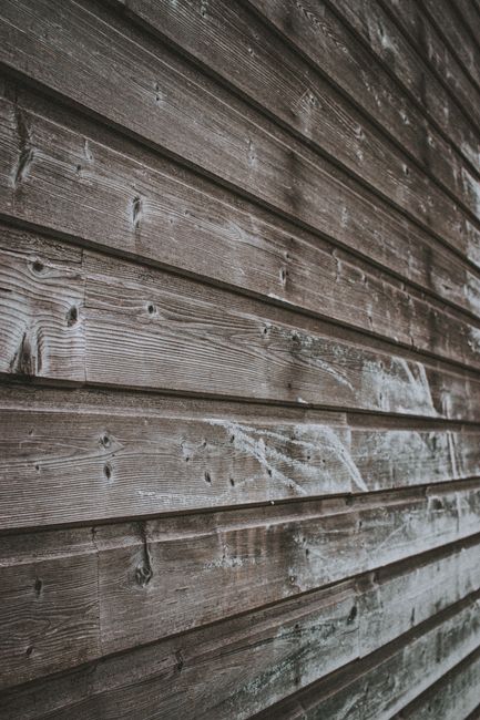 Photo by Mathias Reding on Pexels Weathered wall of aged lumber house covered with stains of dirt in countryside