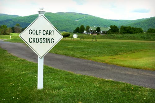 White and Black Road Sign