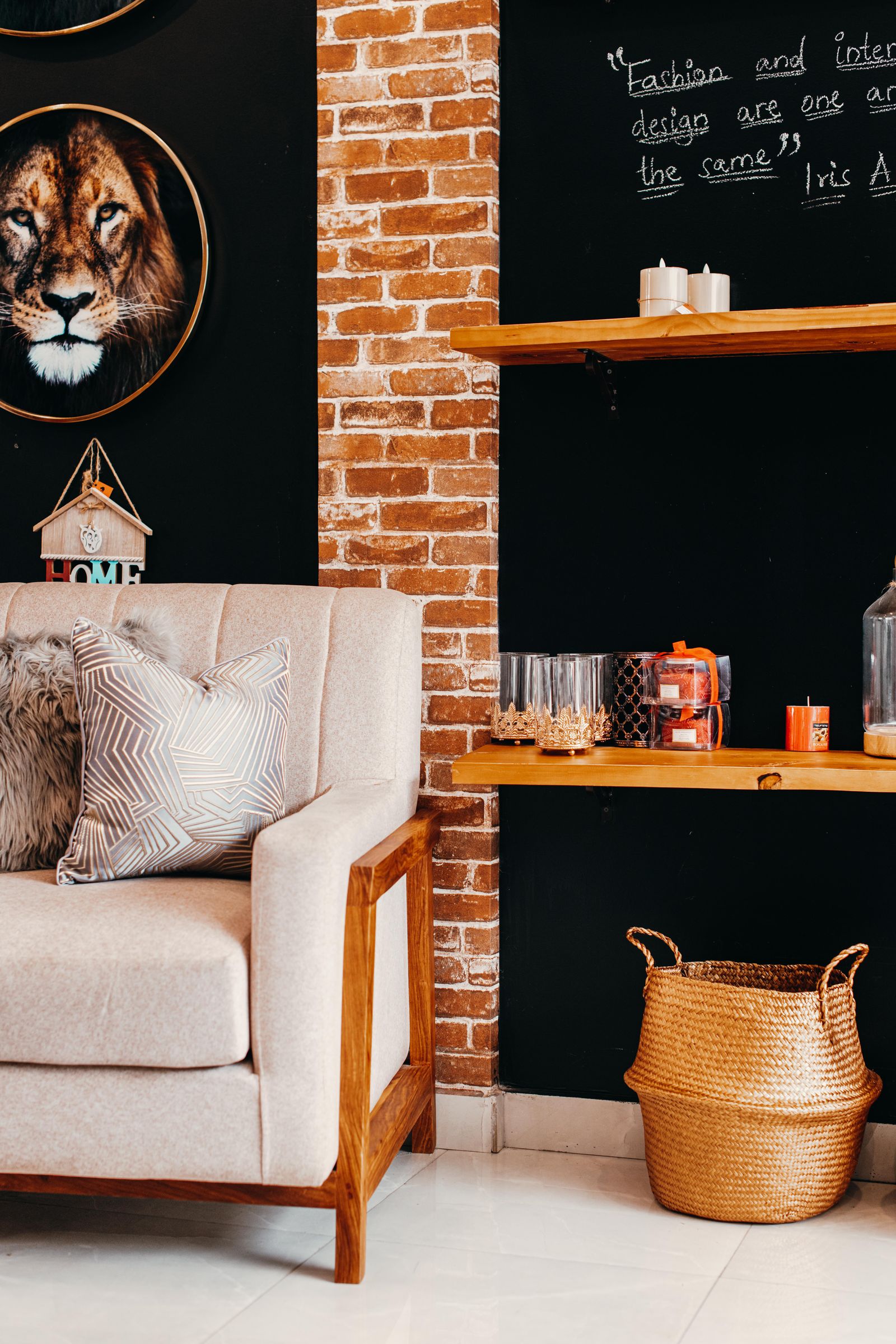 Cozy, tidy living room with shelving and soft furnishings