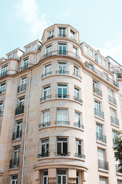 Free From below of aged stone house with oval corner located in historic district Stock Photo