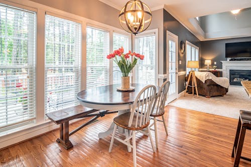 Brown Wooden Round Table With Chairs