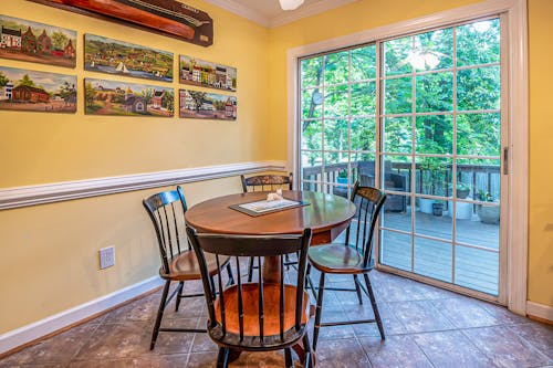 Brown Wooden Table and Chairs