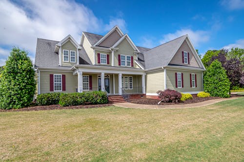 Free American Style Suburban Mansion with Empty Lawn Stock Photo