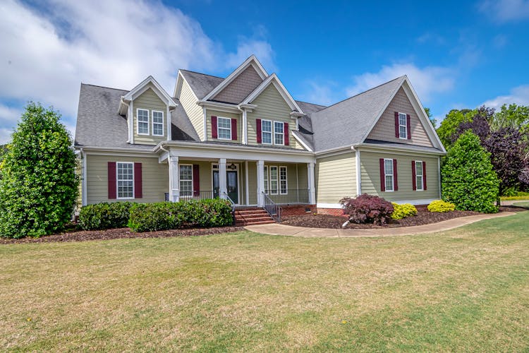 American Style Suburban Mansion With Empty Lawn