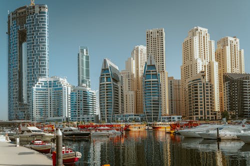 Free Marina with Panorama of Modern Skyscrapers in Background Stock Photo