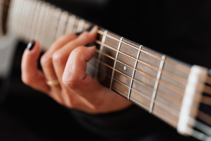 Does playing guitar thicken your fingers?