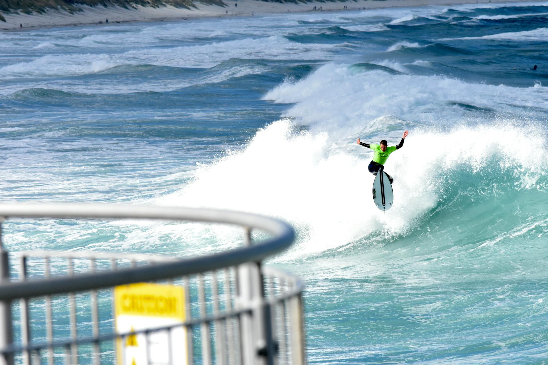 Dynamic capture of a surfer riding the waves at St Clair Beach in Dunedin, New Zealand.