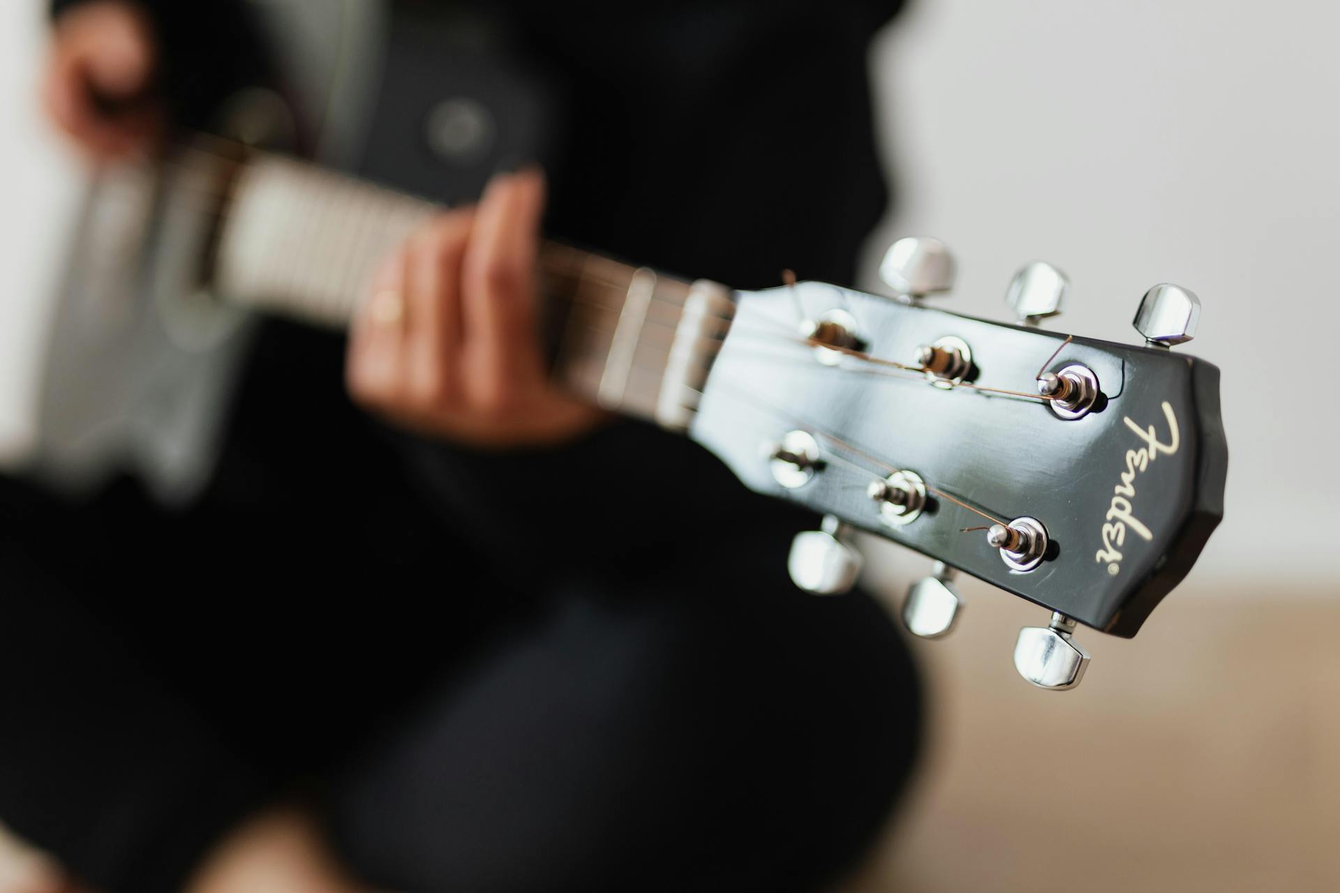 Shallow Focus Photo of Tuning Pegs