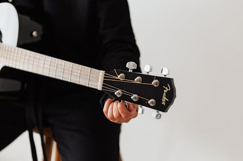 Free Person Holding Tuning Pegs Stock Photo