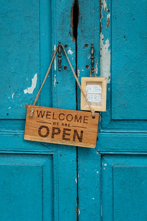 Free Photo of Wooden Signage on Doorknob Stock Photo