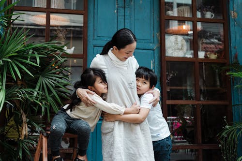 Free Photo of Woman Having Fun With Her Kids Stock Photo