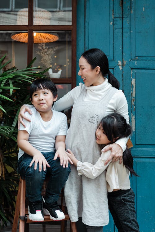 Free Photo of Woman Having Fun With Her Kids Stock Photo