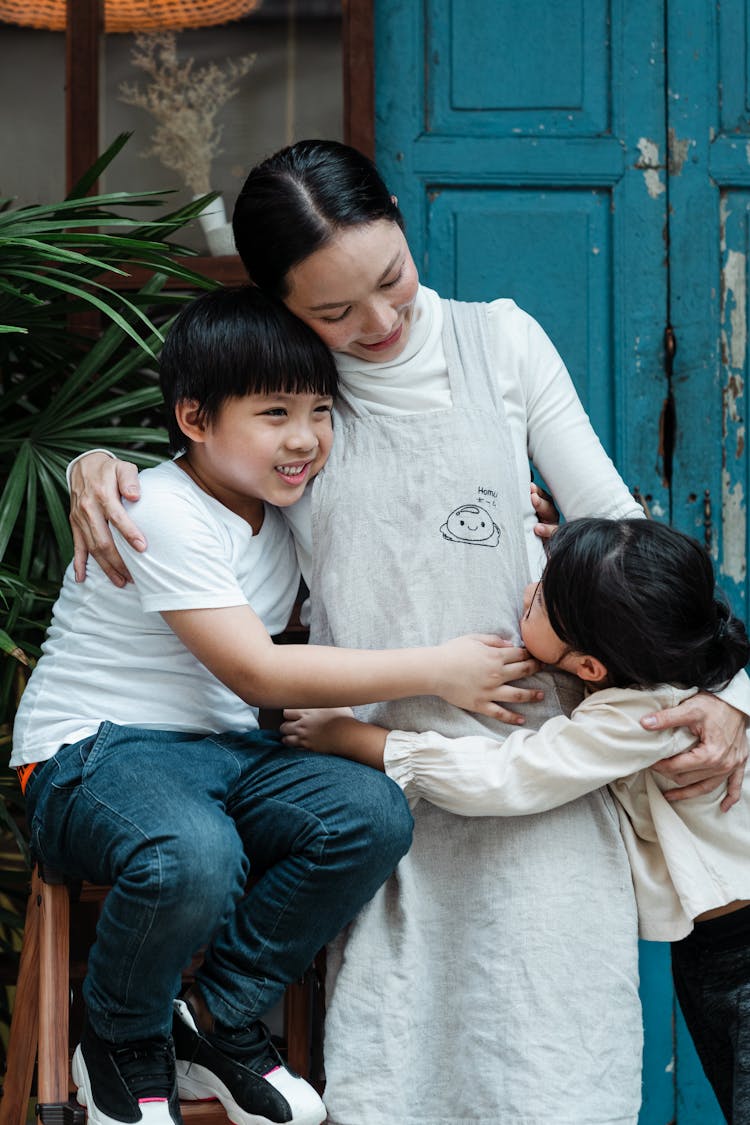 Photo Of Woman Having Fun With Her Kids