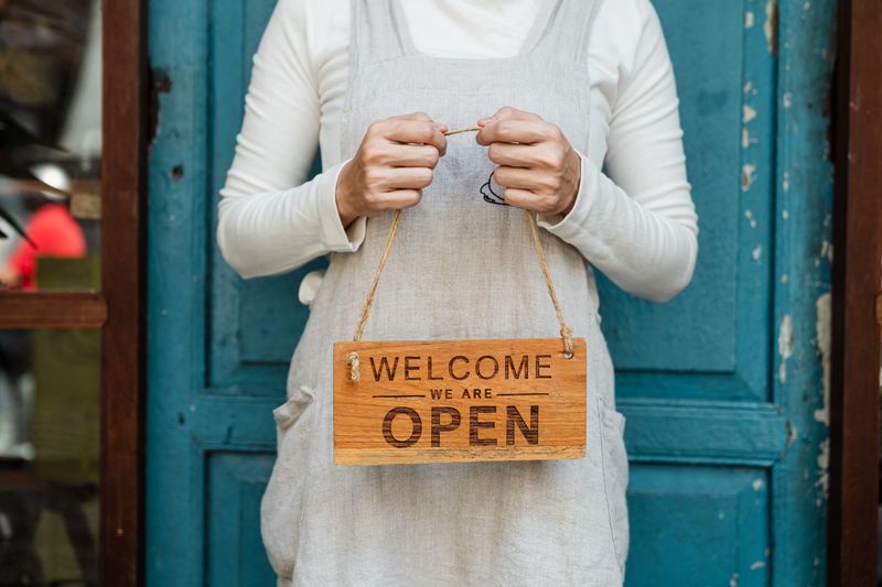 Open sign in a storefront door