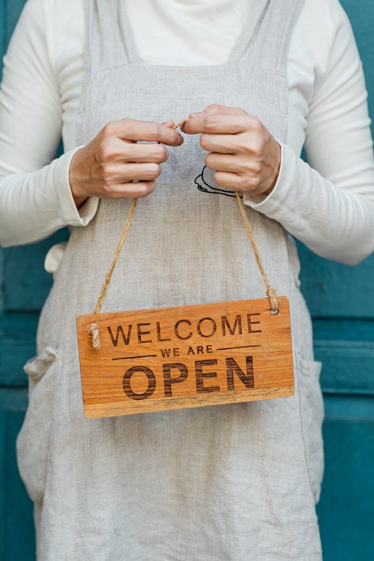 Crop Woman With Open Sign