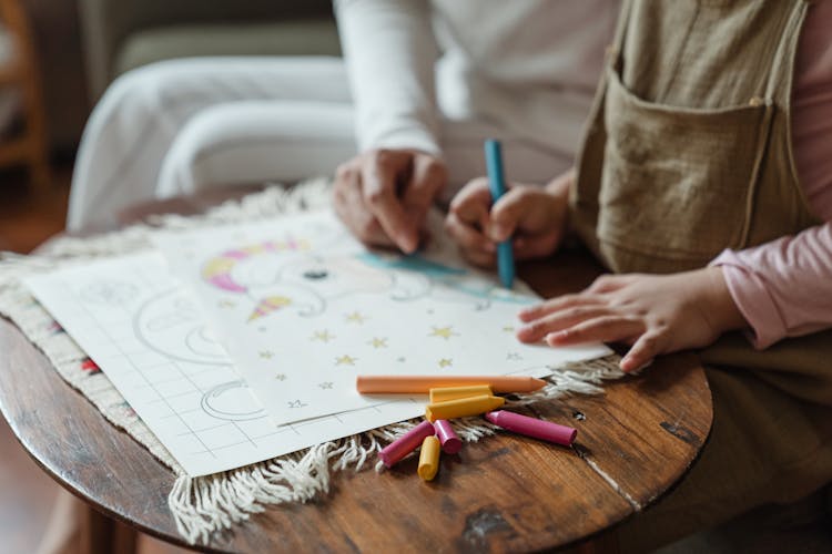 Crop Mother And Kid With Crayon Coloring Pictures