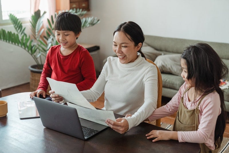 Professional nanny caring for child