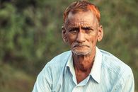 Shallow Focus Photo of an Elderly Man Frowning
