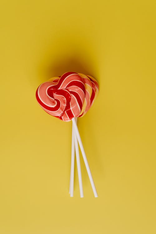 Lollipops on Yellow Background 