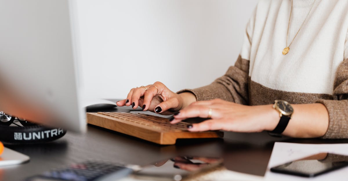 Crop woman typing on creative computer keyboard · Free Stock Photo