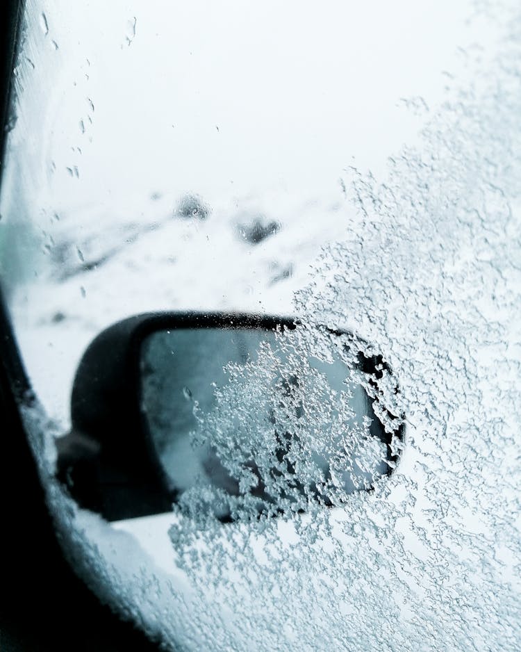 Frozen Window Of Car In Winter