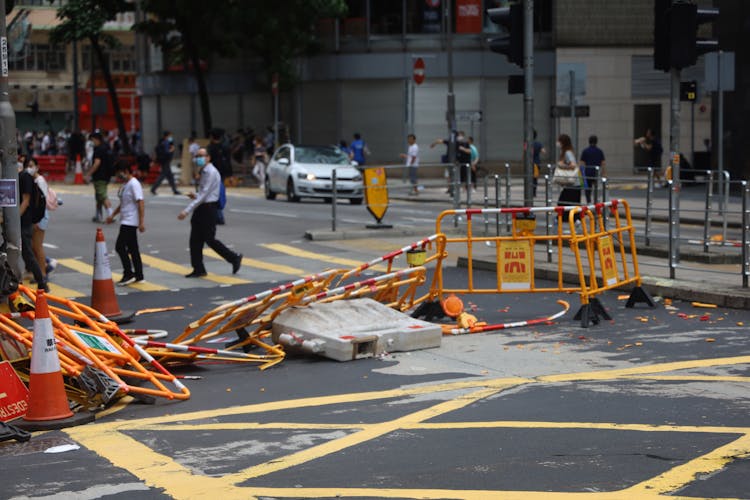 Destroyed Fences On City Street After Mass Meeting