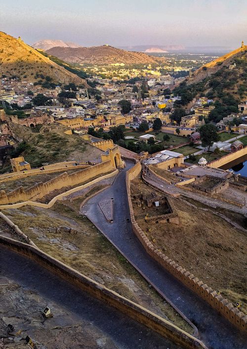 Free High-angle shot of Jaipur cityscape surrounded by hills and historic walls, showcasing vibrant architecture. Stock Photo