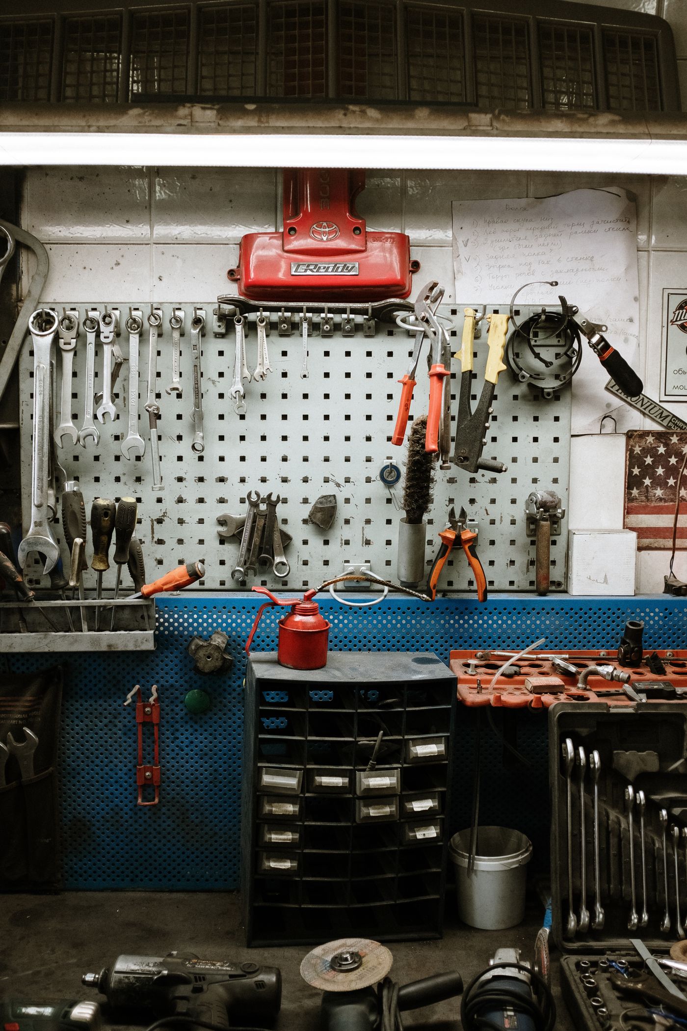 Organized automotive tools displayed on a workshop wall