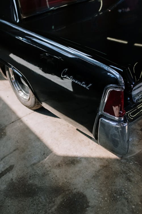 Black Car on Gray Concrete Floor