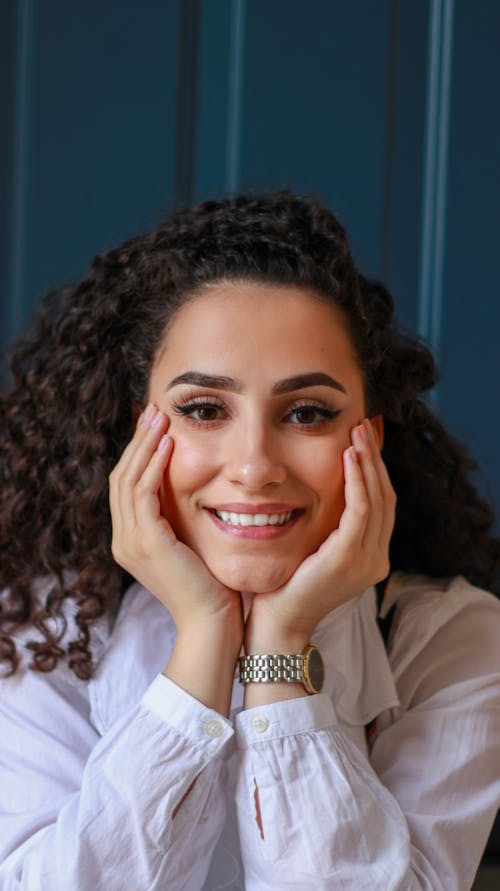 Woman in White Long Sleeve Shirt Smiling