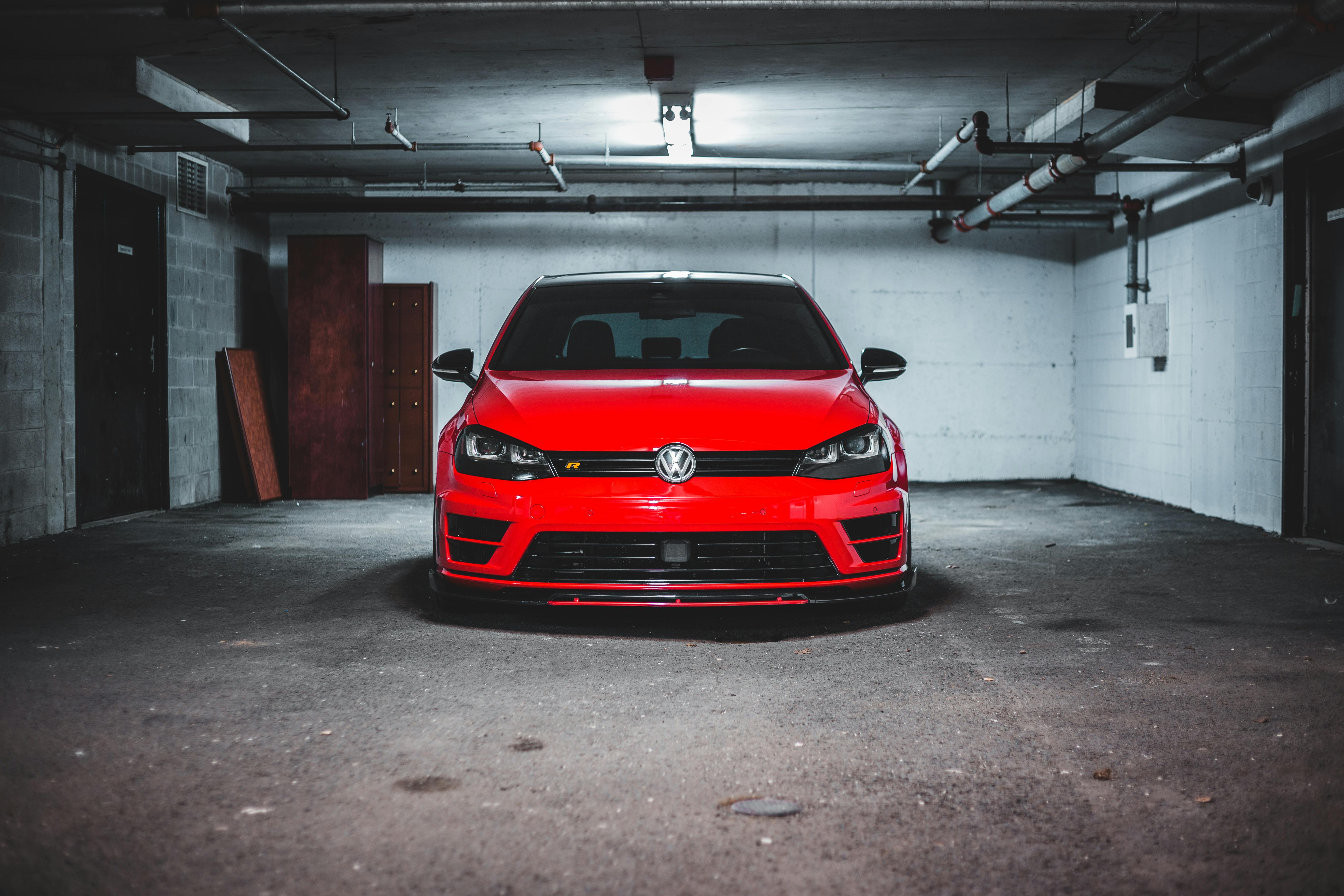 Modern automobile in dark garage · Free Stock Photo