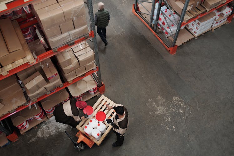 Men Working In A Warehouse