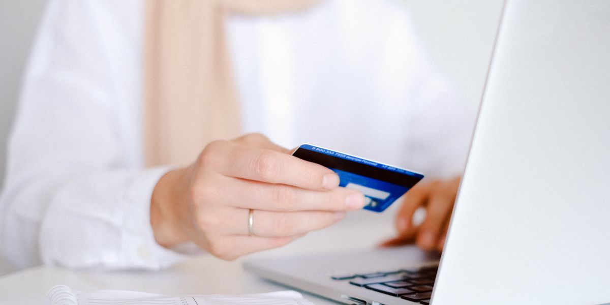 Person reviewing a credit report and personal finances