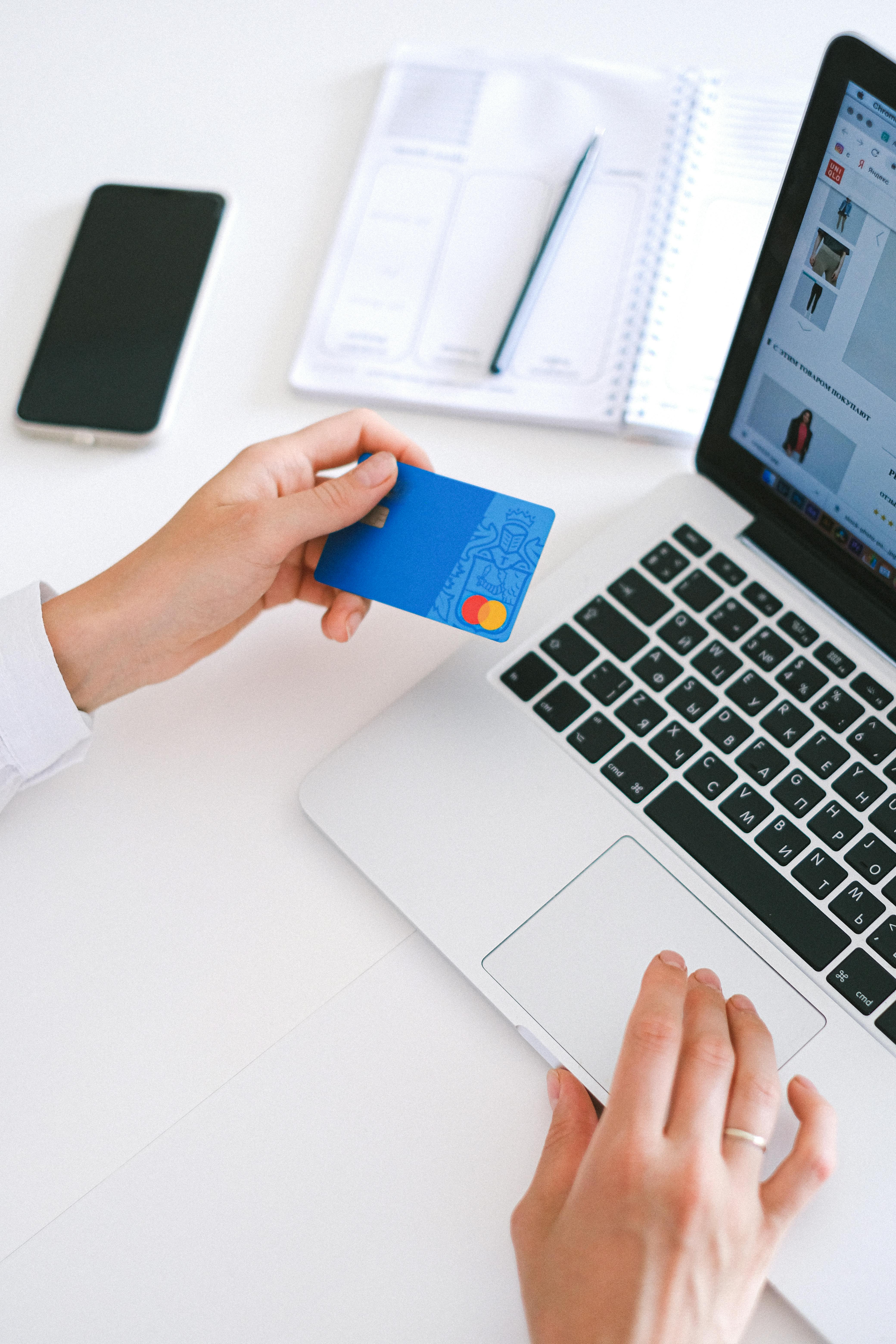 person holding bank card