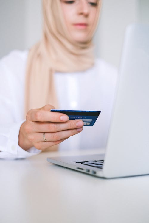 Free Woman Holding Bank Card Stock Photo