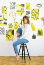 Photo Of Woman Sitting On A Black Stool