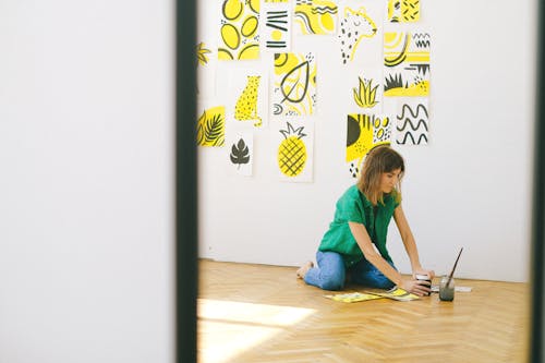 Photo of Woman Sitting on Floor