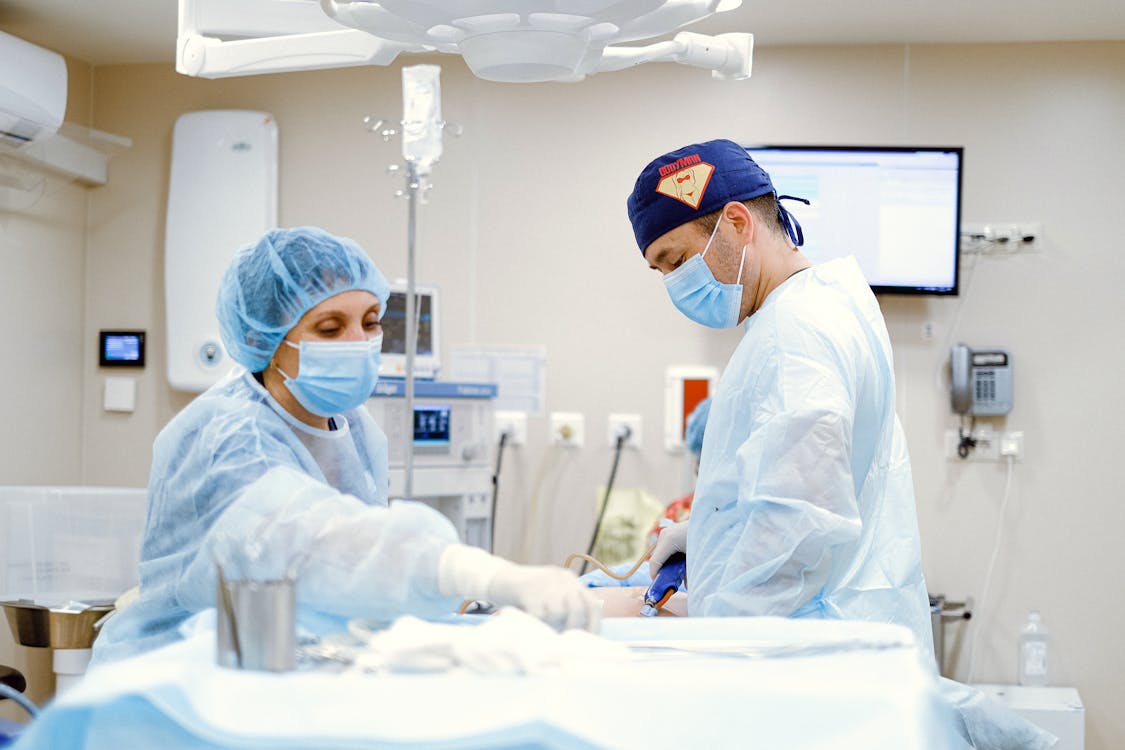 Two doctors in an operating room.