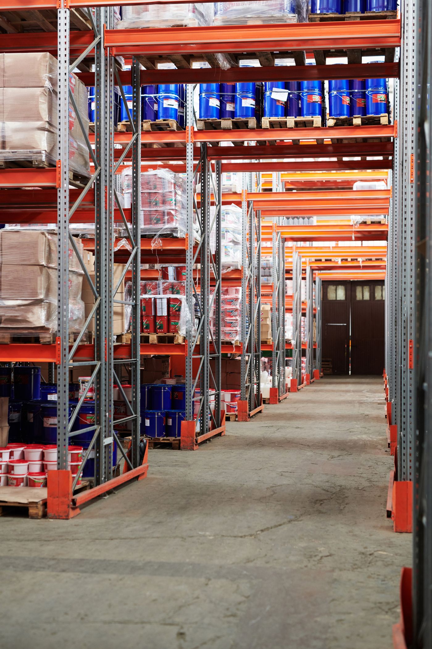 Industrial warehouse interior with organised shelving of packaged goods