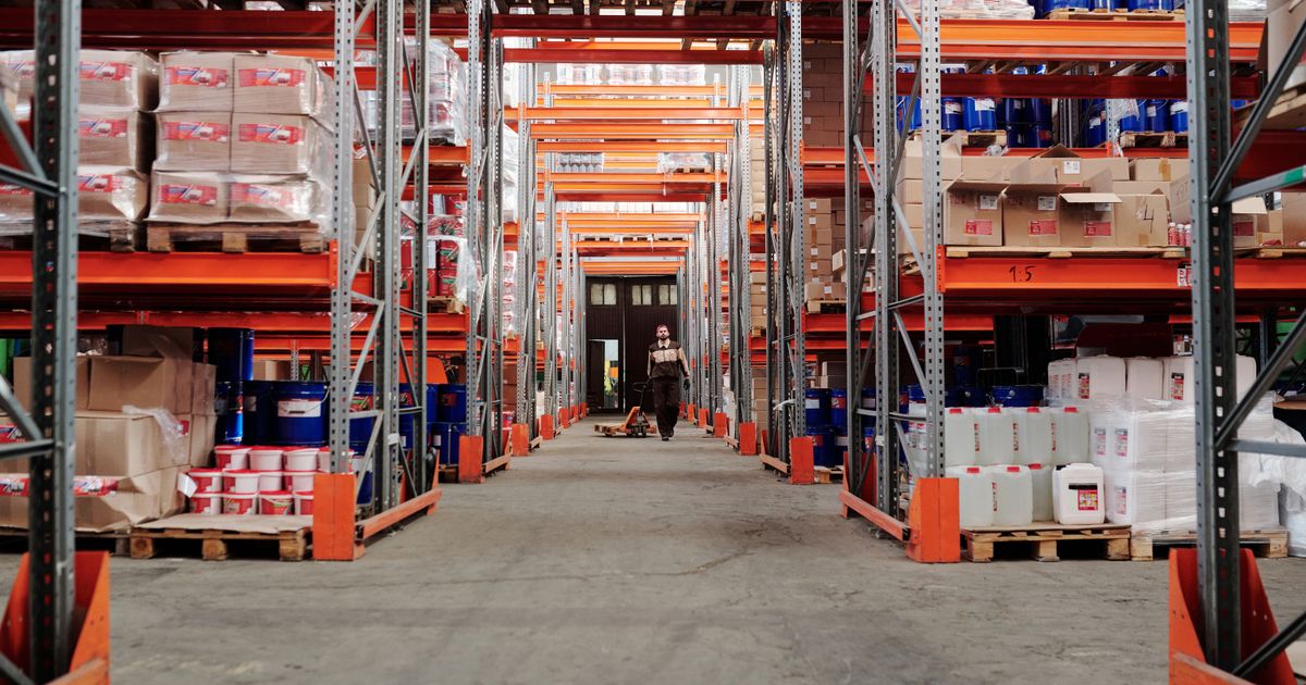 Warehouse stocked with metal shelves