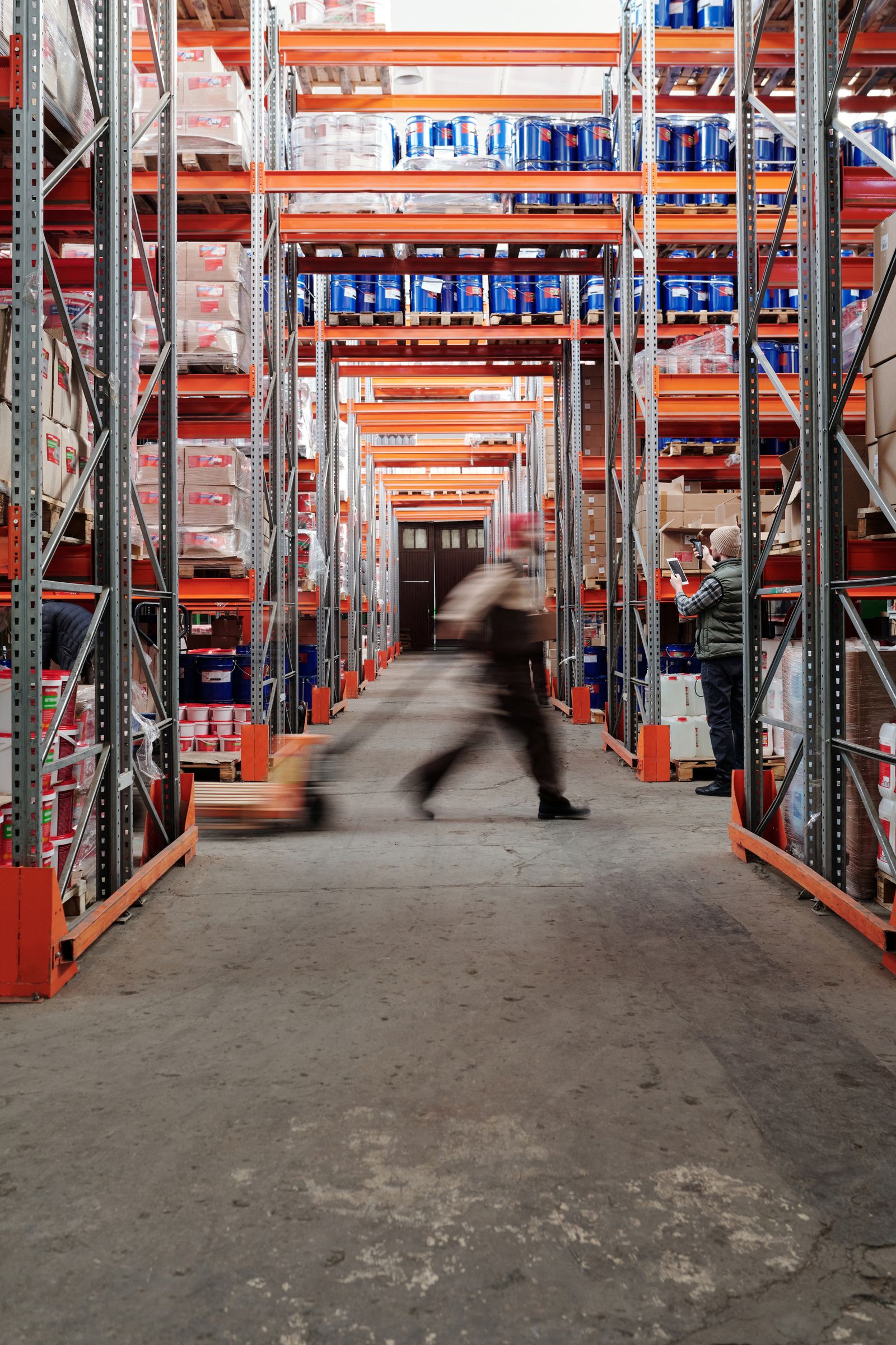 Distribution team using tablets on the warehouse floor