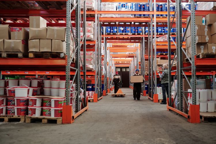 Warehouse workers with boxes