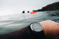 Person Wearing Silver Round Analog Watch