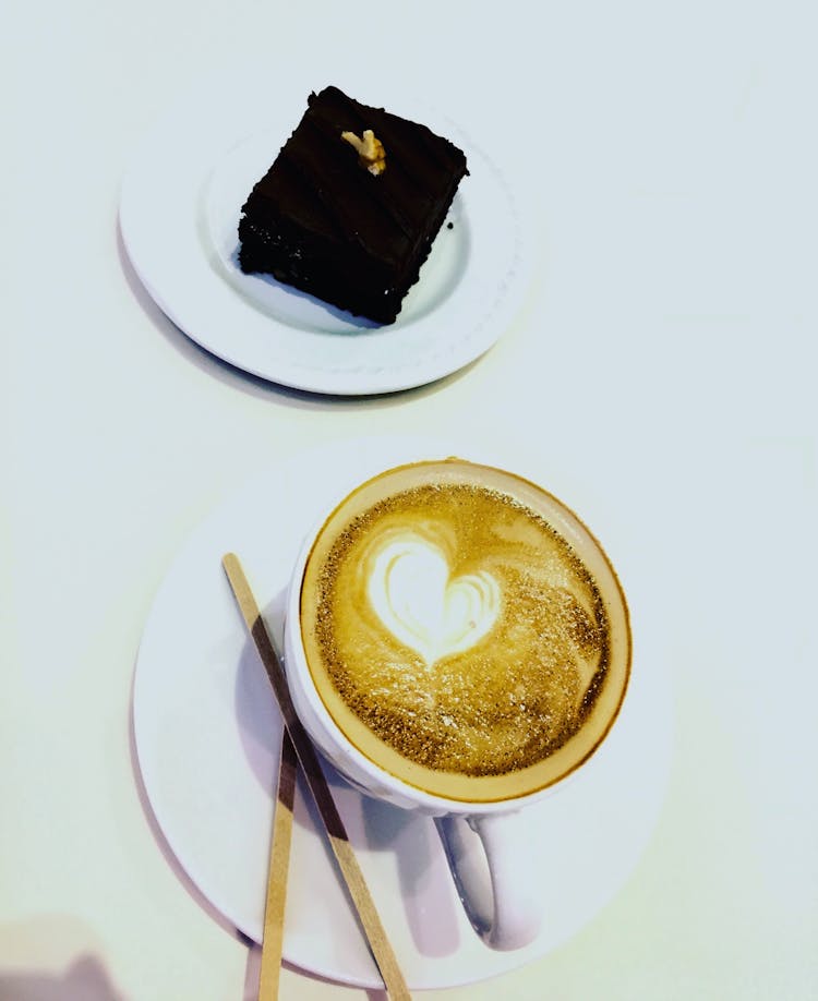 Slice Of Brownies And Coffee Latte