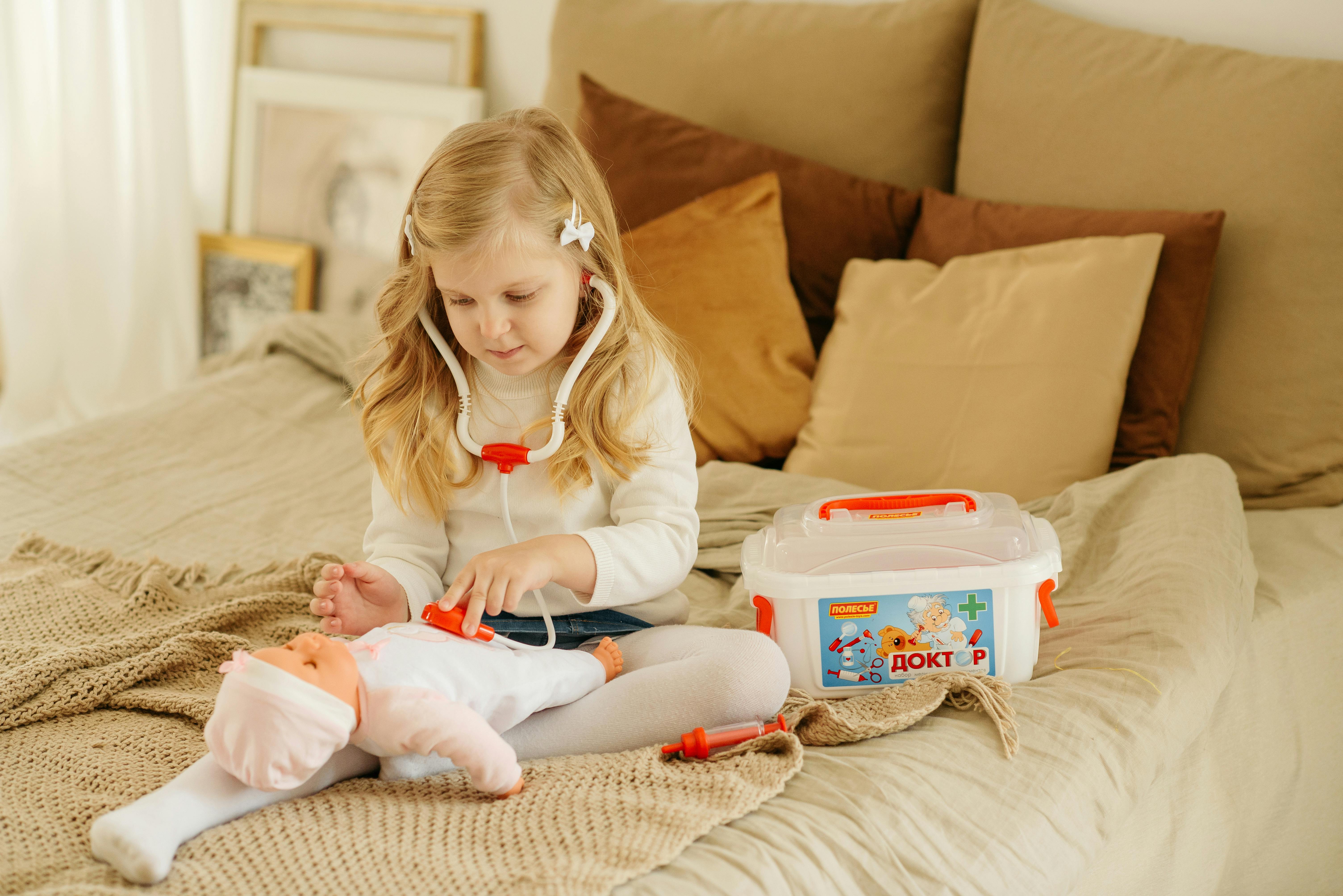 Girl Playing With Baby Doll Free Stock Photo   Pexels Photo 4484804 