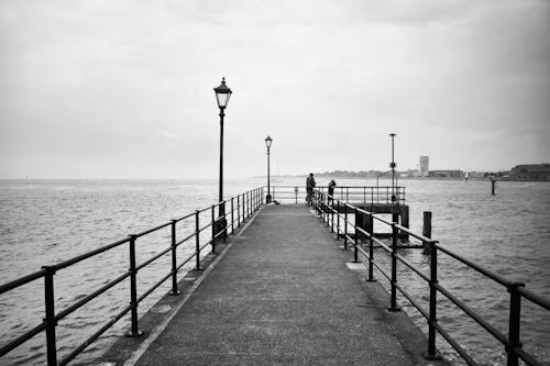 Pier on River in Black and White