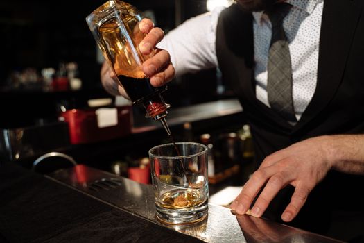 Close up of Barman Hands Preparing Drink